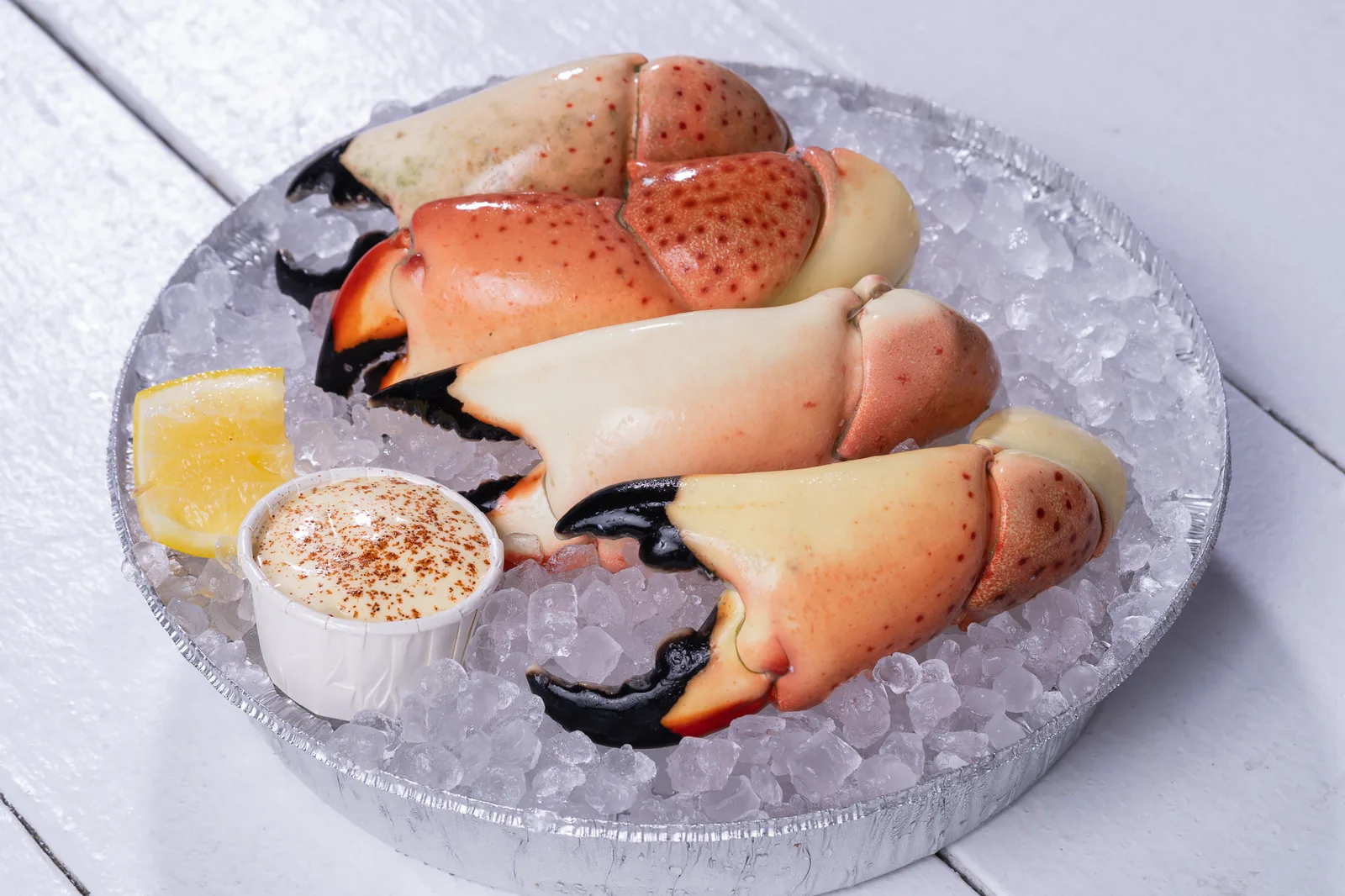Stone crab claws plated at The Lazy Oyster